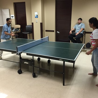 Vikas and Hemangini taking a break from research with some ping-pong (August 9, 2016)
